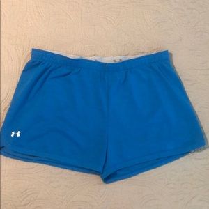 Blue under armor shorts, 94% polyester.